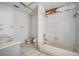 Bathroom with bathtub, toilet, and sink. Needs updating at 2650 Hilliard Ct, Kissimmee, FL 34744