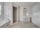 Bathroom with a vanity, shower, and bathtub at 2650 Hilliard Ct, Kissimmee, FL 34744