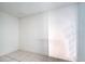 Small empty bedroom with white walls and tiled floors at 2650 Hilliard Ct, Kissimmee, FL 34744