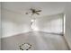 Spacious bedroom with tiled floors and a door to another room at 2650 Hilliard Ct, Kissimmee, FL 34744