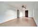 Simple bedroom with tile flooring and door to bathroom at 2650 Hilliard Ct, Kissimmee, FL 34744