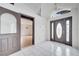 Bright entryway with tiled floors and two doors at 2650 Hilliard Ct, Kissimmee, FL 34744