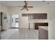Kitchen with dark brown cabinets and a view of another room at 2650 Hilliard Ct, Kissimmee, FL 34744