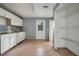 Simple kitchen with white cabinets and vinyl flooring at 2650 Hilliard Ct, Kissimmee, FL 34744