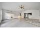 Open living space with tiled floors and water damage visible on walls at 2650 Hilliard Ct, Kissimmee, FL 34744