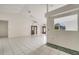 Open living area with high ceilings and tile floors at 2650 Hilliard Ct, Kissimmee, FL 34744
