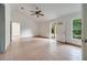 Open living area with tile floors and access to backyard at 2650 Hilliard Ct, Kissimmee, FL 34744