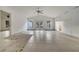 Large living room with tile floors and sliding glass doors leading to backyard at 2650 Hilliard Ct, Kissimmee, FL 34744