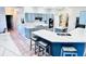 Modern eat-in kitchen featuring gray cabinetry, sleek countertops, and stainless steel appliances at 2949 Zaharias Dr, Orlando, FL 32837