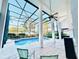 Spacious pool area with a covered patio and seating at 2949 Zaharias Dr, Orlando, FL 32837