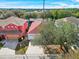 One-story house with red tile roof and driveway at 319 Sand Ridge Dr, Davenport, FL 33896