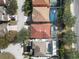 House with red tile roof and pool in backyard at 319 Sand Ridge Dr, Davenport, FL 33896