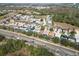 Aerial view of houses and neighborhood at 319 Sand Ridge Dr, Davenport, FL 33896