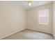 Well-lit bedroom featuring ceiling fan and window with blinds at 319 Sand Ridge Dr, Davenport, FL 33896