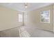 Bright bedroom featuring carpet and window blinds at 319 Sand Ridge Dr, Davenport, FL 33896