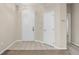 Clean entryway with tile flooring and two doors at 319 Sand Ridge Dr, Davenport, FL 33896