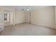 Spacious living area with carpeted floor and neutral walls at 319 Sand Ridge Dr, Davenport, FL 33896