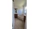 Bathroom with corner tub, double vanity, and tiled floor at 3459 Allegra Cir, St Cloud, FL 34772