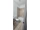 Clean bathroom with tile flooring, bathtub, and toilet at 3459 Allegra Cir, St Cloud, FL 34772
