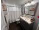 Updated bathroom with modern vanity and shower-tub combination at 4575 S Texas Ave # 207, Orlando, FL 32839