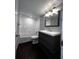 Bathroom showcasing a vanity with drawers, bathtub with white tile, and modern fixtures at 4575 S Texas Ave # 207, Orlando, FL 32839