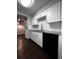 Modern kitchen featuring white cabinetry, stainless steel appliances, and subway tile backsplash at 4575 S Texas Ave # 207, Orlando, FL 32839