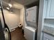 Convenient laundry area with stacked washer and dryer at 4575 S Texas Ave # 207, Orlando, FL 32839