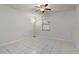 Spacious bedroom with tiled floor and ample natural light at 46 W Marbrisa Way, Kissimmee, FL 34743
