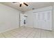 Spacious bedroom with tile flooring and large closet at 46 W Marbrisa Way, Kissimmee, FL 34743