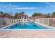 Beautiful community swimming pool with clear blue water and a screened-in pavilion at 46 W Marbrisa Way, Kissimmee, FL 34743
