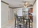 Bright dining area with glass-top table and four chairs at 46 W Marbrisa Way, Kissimmee, FL 34743