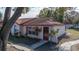 Cute single story home with red tile roof and landscaping at 46 W Marbrisa Way, Kissimmee, FL 34743