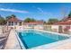 Sparkling community pool with surrounding patio at 46 W Marbrisa Way, Kissimmee, FL 34743