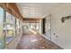 Sunroom offering tile floors and sliding glass doors at 46 W Marbrisa Way, Kissimmee, FL 34743