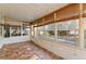 Sunroom features tile floors and multiple windows at 46 W Marbrisa Way, Kissimmee, FL 34743