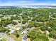 Single-story house with solar panels near a lake at 4755 Oakwood Dr, St Cloud, FL 34772