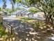 Cute house with a large yard and wooden fence at 4755 Oakwood Dr, St Cloud, FL 34772