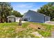 House exterior and large backyard with shed at 4755 Oakwood Dr, St Cloud, FL 34772
