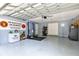 Garage with storage shelving and gym equipment at 4755 Oakwood Dr, St Cloud, FL 34772