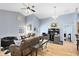 Bright living room with hardwood floors and comfortable seating at 4755 Oakwood Dr, St Cloud, FL 34772