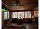 Gathering room with wood ceiling, large windows, and view of the pool area at 5030 Haywood Ruffin Rd, St Cloud, FL 34771