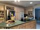 Spacious kitchen with ample cabinetry, island, and stainless steel appliances at 5030 Haywood Ruffin Rd, St Cloud, FL 34771