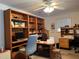 Home office with built-in shelving and plenty of workspace at 5030 Haywood Ruffin Rd, St Cloud, FL 34771