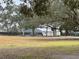 Small shed or storage unit on grassy lot at 5030 Haywood Ruffin Rd, St Cloud, FL 34771