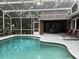Relaxing screened pool and patio area at 5030 Haywood Ruffin Rd, St Cloud, FL 34771