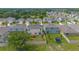 Aerial view of house and neighborhood, showcasing backyard at 5283 Bracks Landing Dr Dr, St Cloud, FL 34771
