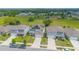 Neighborhood view showcasing several two-story houses at 5283 Bracks Landing Dr Dr, St Cloud, FL 34771