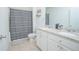 Clean bathroom with double vanity and granite countertop at 5283 Bracks Landing Dr Dr, St Cloud, FL 34771