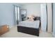 Bedroom with full-size bed and large teddy bear at 5283 Bracks Landing Dr Dr, St Cloud, FL 34771