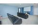 Home theater with two reclining chairs and projector screen at 5283 Bracks Landing Dr Dr, St Cloud, FL 34771